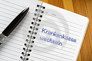 Note in german language: Krankenkasse wechseln photo